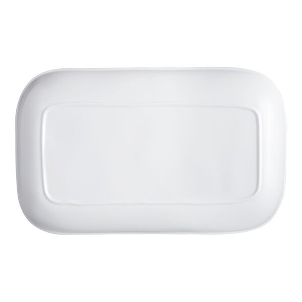 A white, rectangular platter with rounded corners and a slightly raised edge.