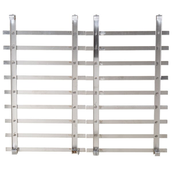 A stainless steel metal grid with four metal bars in a white metal frame.