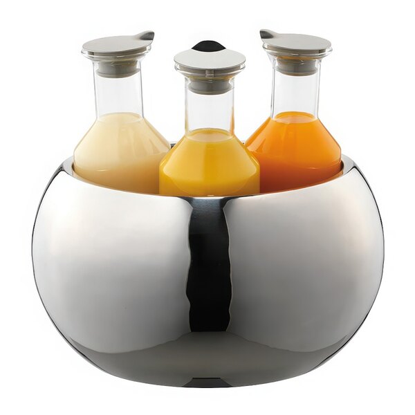 A Frilich stainless steel beverage tub holding three carafes filled with orange juice.