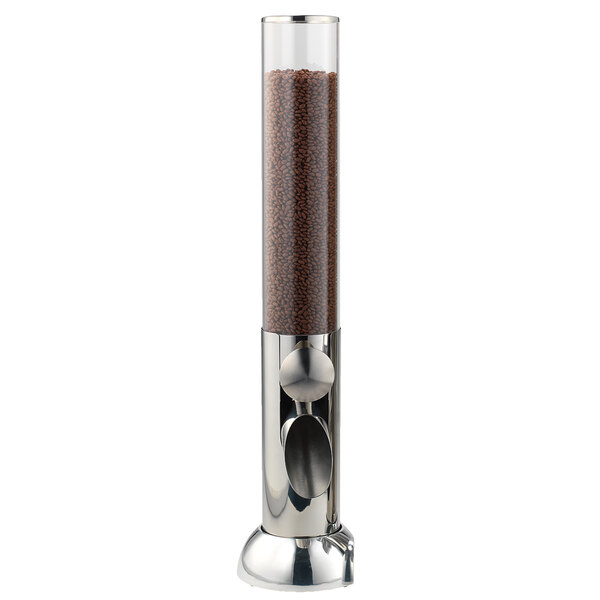A Frilich dry food dispenser module with a glass top and metal base filled with brown grains.