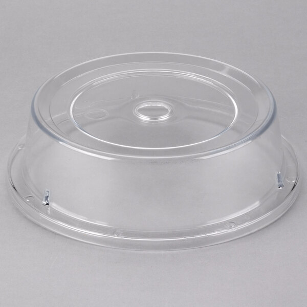 A clear Carlisle polycarbonate plate cover with a circular hole.