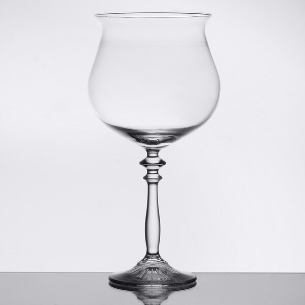 A clear Libbey Gin and Tonic glass with a stem.