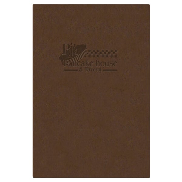 A brown customizable Menu Solutions menu board with picture corners on a table with a brown menu on it.