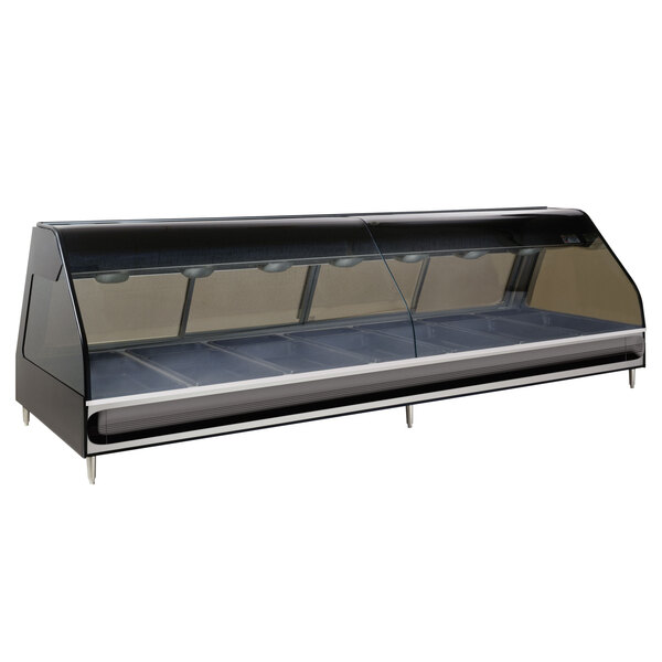 An Alto-Shaam heated display case with clear glass over two compartments on a counter.