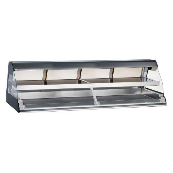 An Alto-Shaam stainless steel heated display case with glass top on a counter.