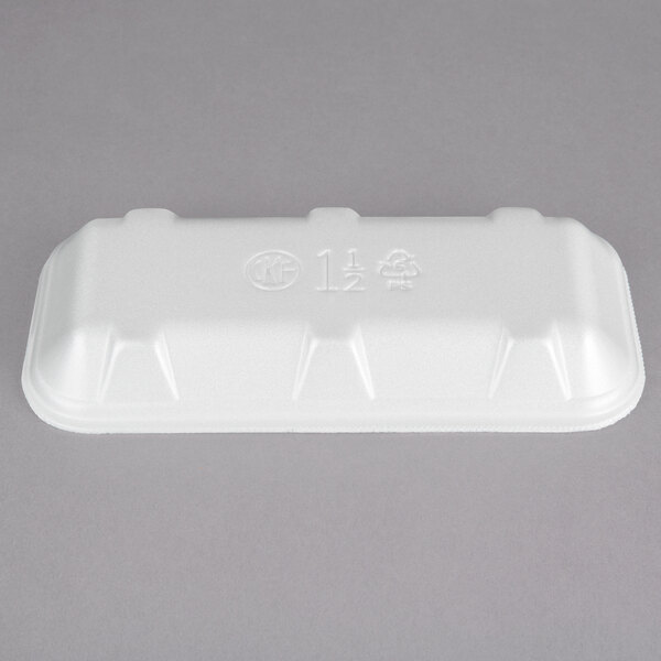 A close-up of a white styrofoam CKF meat tray with numbers and letters.