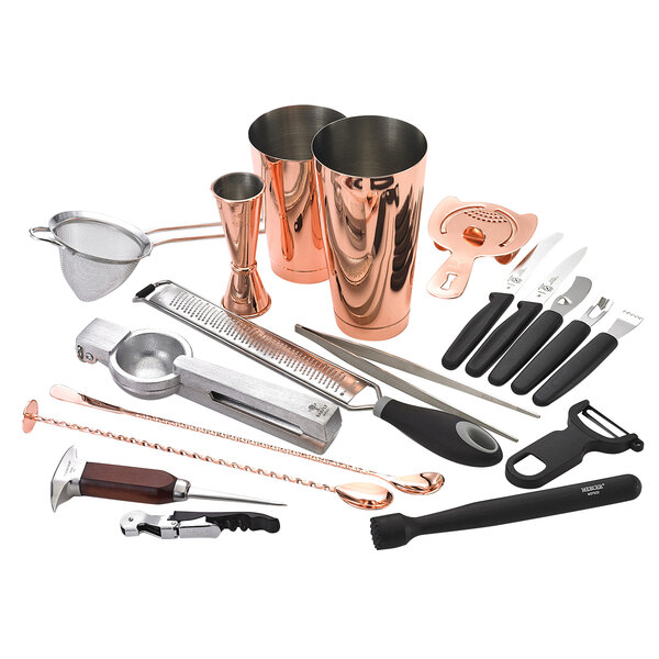 A Barfly copper-plated bartender kit on a counter with copper and black tools.