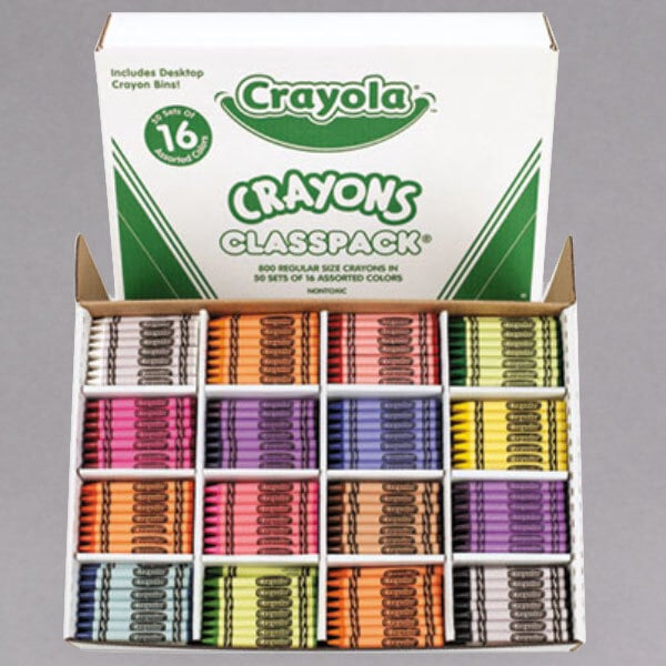 A white box with green text reading "Crayola Classpack 800 Assorted Regular Size Crayons" containing a variety of crayons.