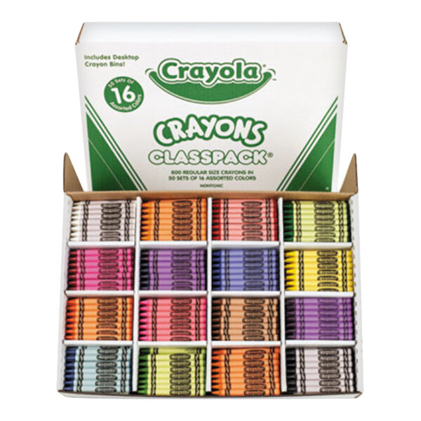 An open box containing multiple compartments filled with assorted colored crayons arranged neatly in rows.