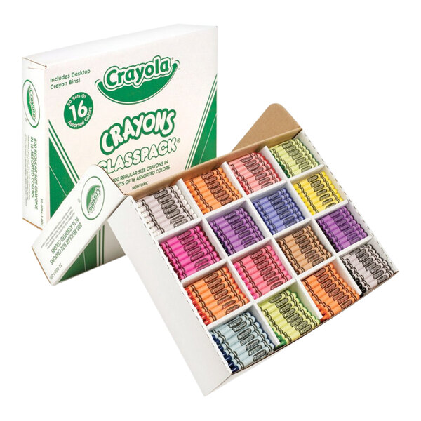 An open box containing multiple compartments of assorted colored crayons arranged neatly in rows, with a closed box of the same product in the background.