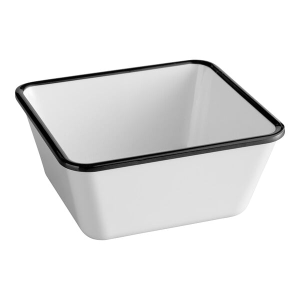 A white square bowl with black rim.