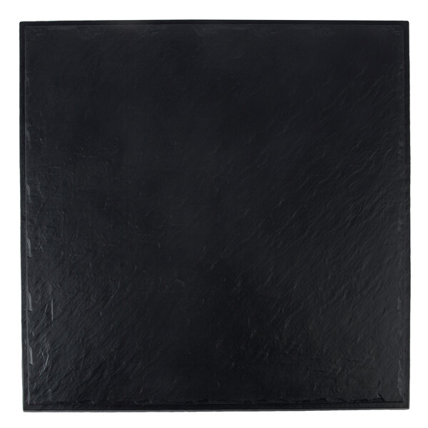 A black square Tablecraft faux slate melamine display tray with a white border.
