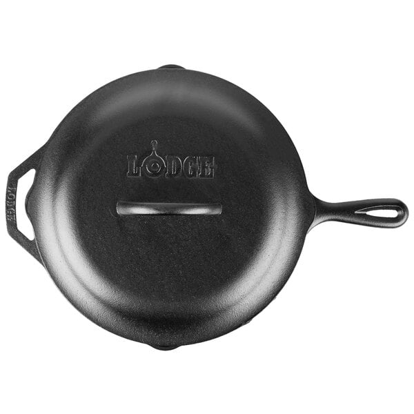 A Lodge black cast iron skillet with a handle.