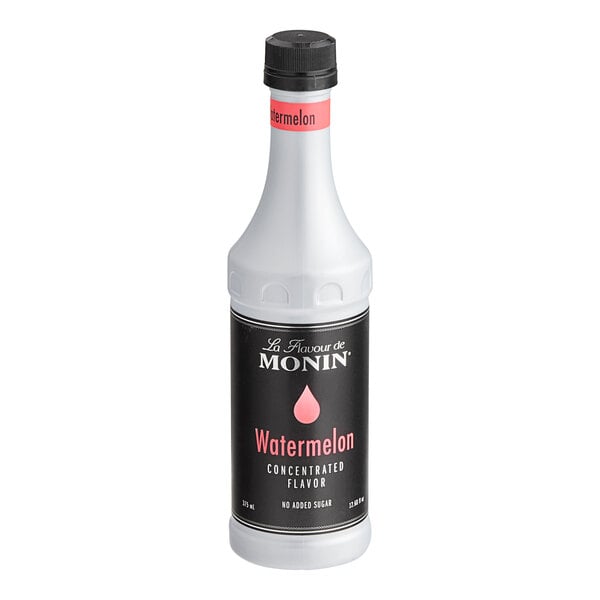 A white bottle of Monin Watermelon Concentrated Flavor with a black label.