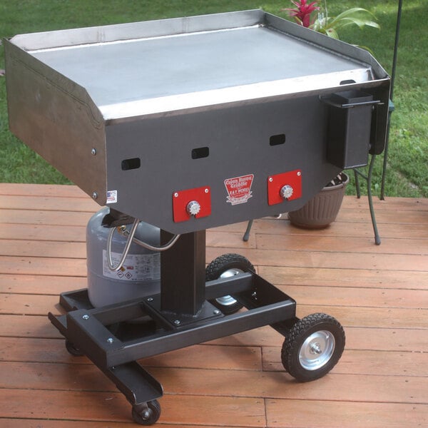 outdoor griddle connected to a liquid propane tank
