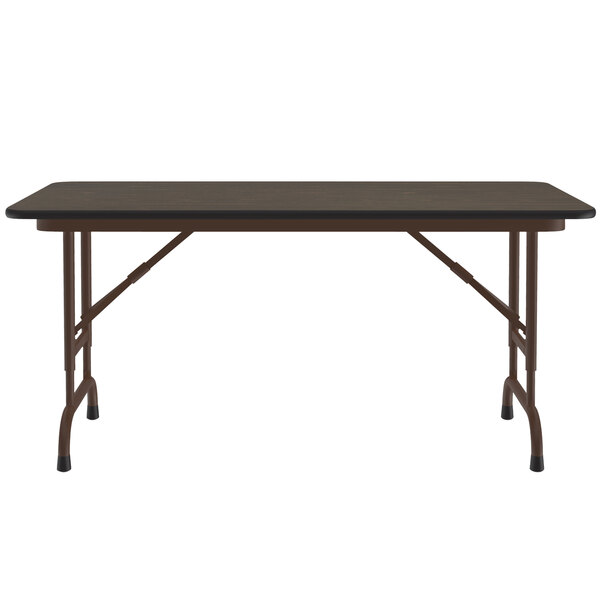 A walnut Correll folding table with an adjustable height and a melamine top.