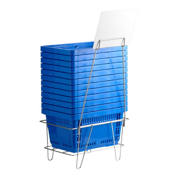 A stack of blue plastic grocery market shopping baskets with a metal stand and a sign holder.