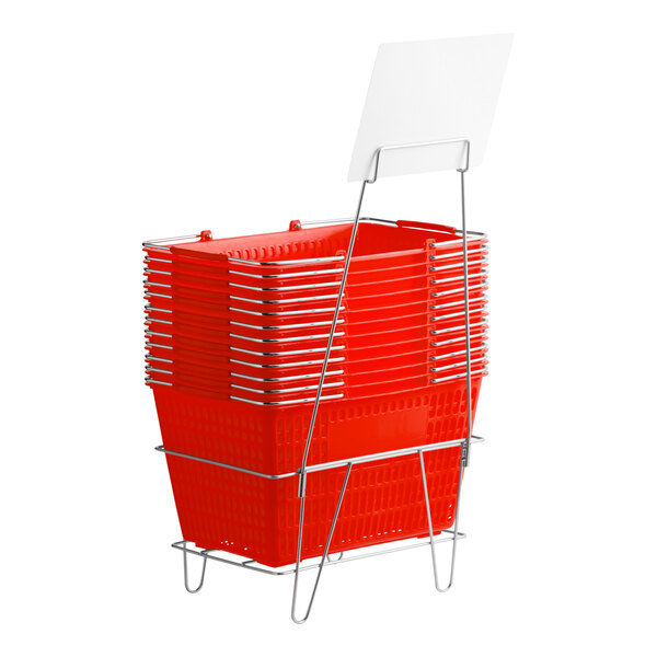 A set of red plastic grocery market shopping baskets stacked on a metal stand with a sign holder.