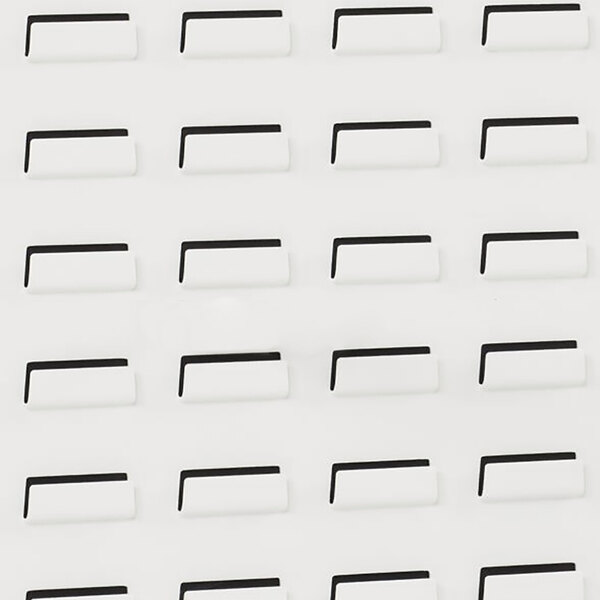 A white rectangular Metro qwikSIGHT louvered wall panel with black rectangular objects.
