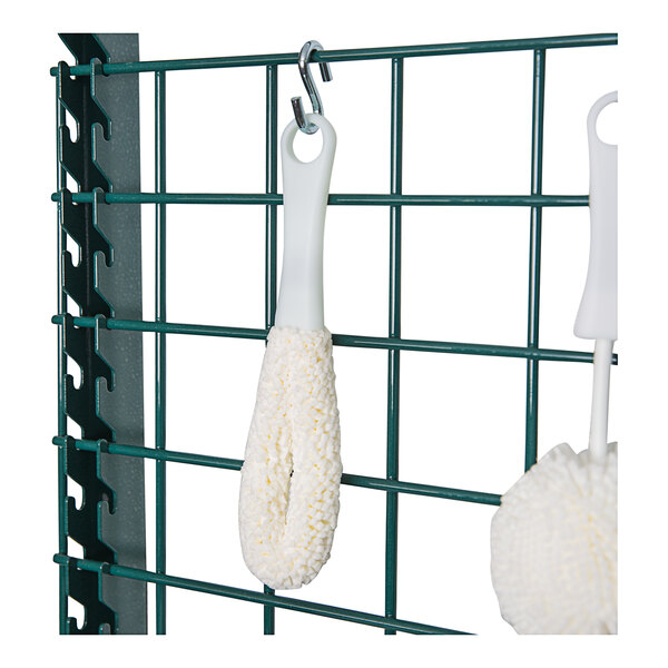 Two Franmara glassware washing brushes with foam loop heads hanging on a hook.