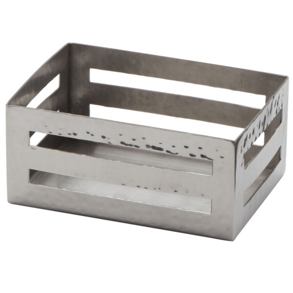 An American Metalcraft stainless steel rectangular sugar caddy with a hammered design and holes in it.