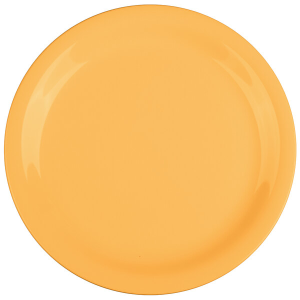 A close-up of a GET Tropical Yellow narrow rim melamine plate.