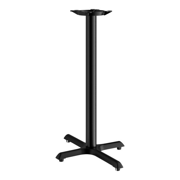 A Lancaster Table & Seating black cast iron bar height table base with a cross.