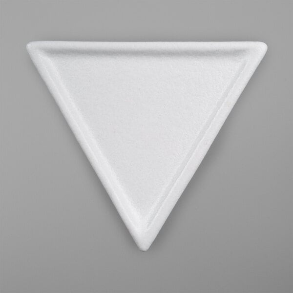 A white triangle shaped platter.