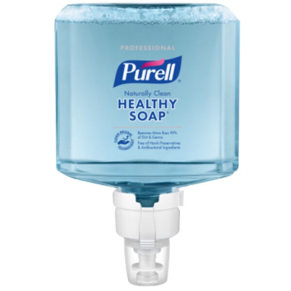 A close-up of a clear plastic Purell Healthy Soap bottle with a pump.