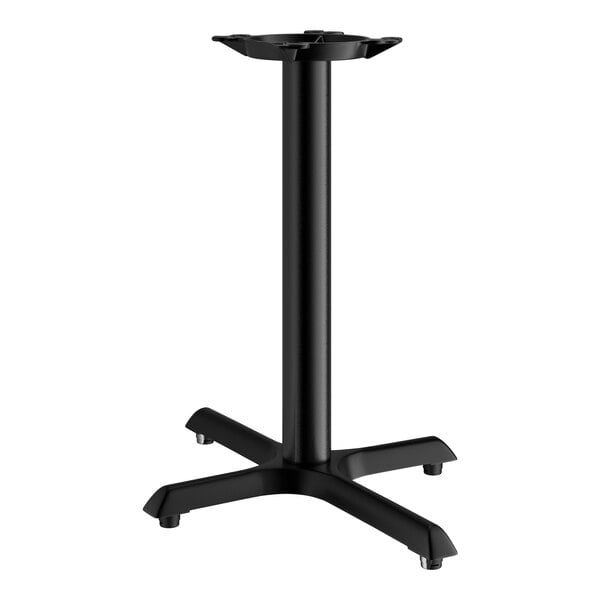 A Lancaster Table & Seating black metal table base with a cross-shaped bottom.