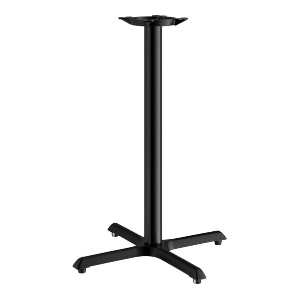A Lancaster Table & Seating black cast iron bar height table base with a black pole.