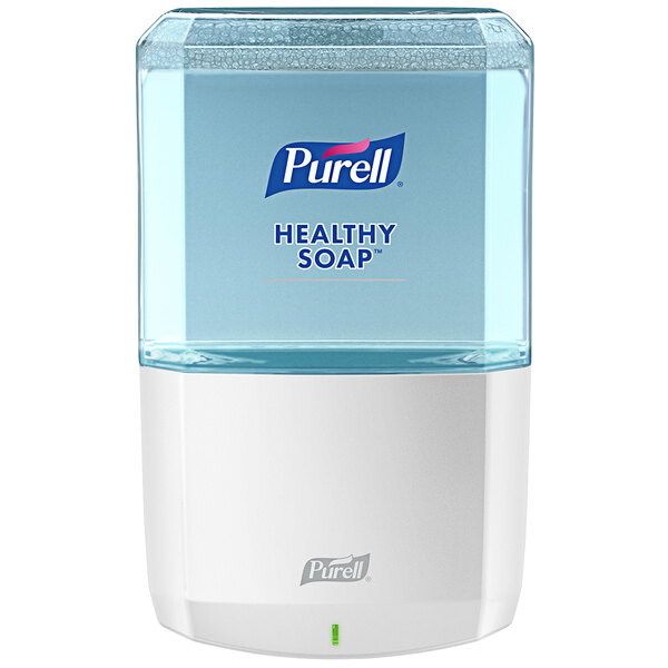 A white Purell® automatic soap dispenser with a clear liquid.