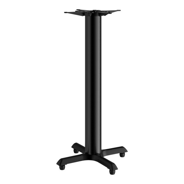 A black Lancaster Table & Seating cast iron bar height column table base.