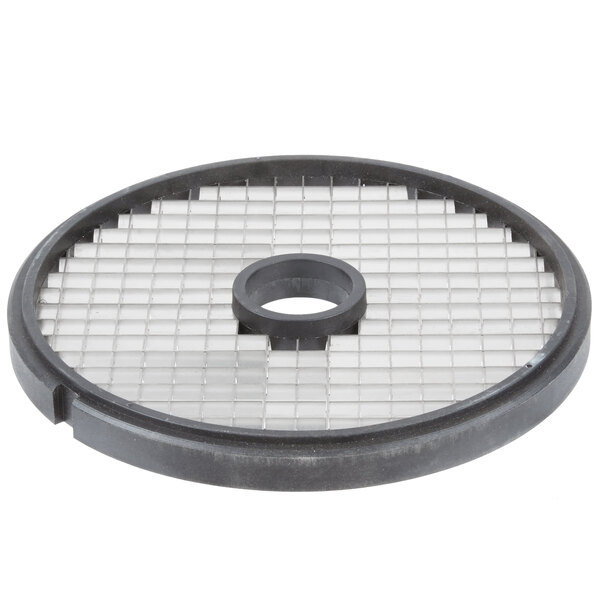 A circular metal dicing grid with holes.