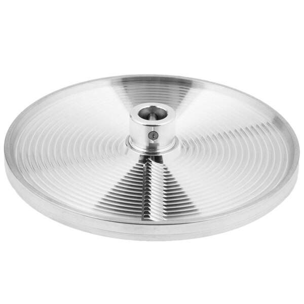 A silver metal Berkel crimping plate with a circular hole.