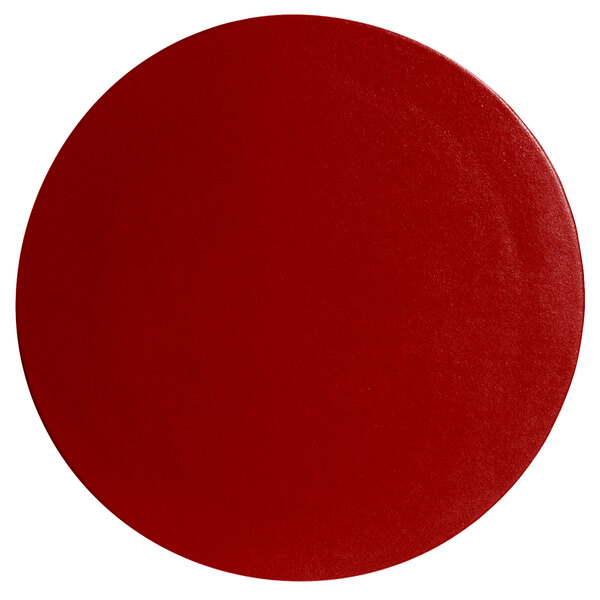 A fire red round disc with a textured finish.