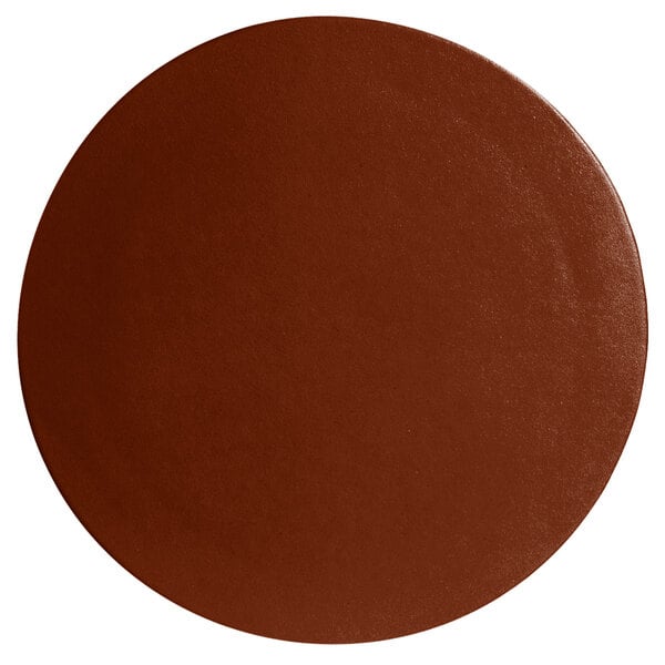 A brown circle with a textured finish.