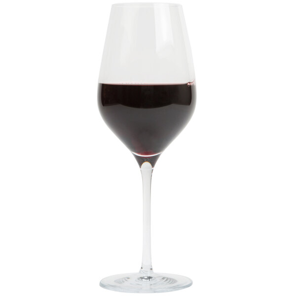 A Stolzle Exquisit Royal wine glass filled with red wine.