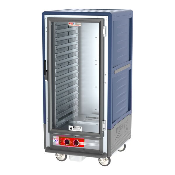 A blue and silver Metro C5 heated holding cabinet with clear doors on wheels.