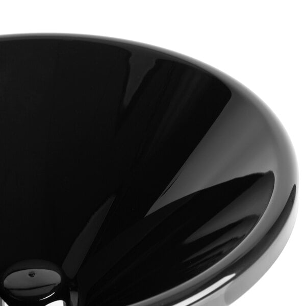 A close-up of a black Franmara Wine Tasting Spittoon lid.