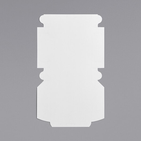 A white rectangular pie / bakery box with cut out corners.