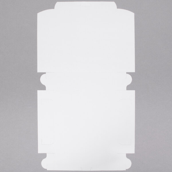 A white bakery box with a flap open.