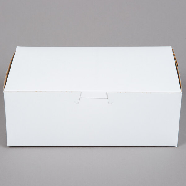A white bakery box with a lid.