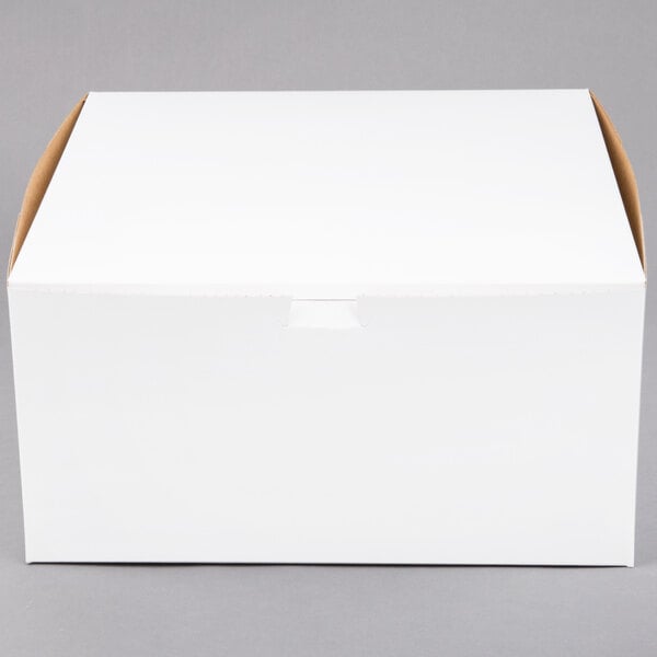 A white box with a brown lid.