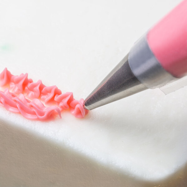 A close-up of an Ateco Cross-Top Piping Tip.