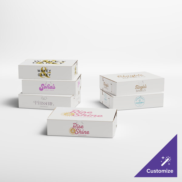 A white customizable bakery box with blue, gold, and black text on it.
