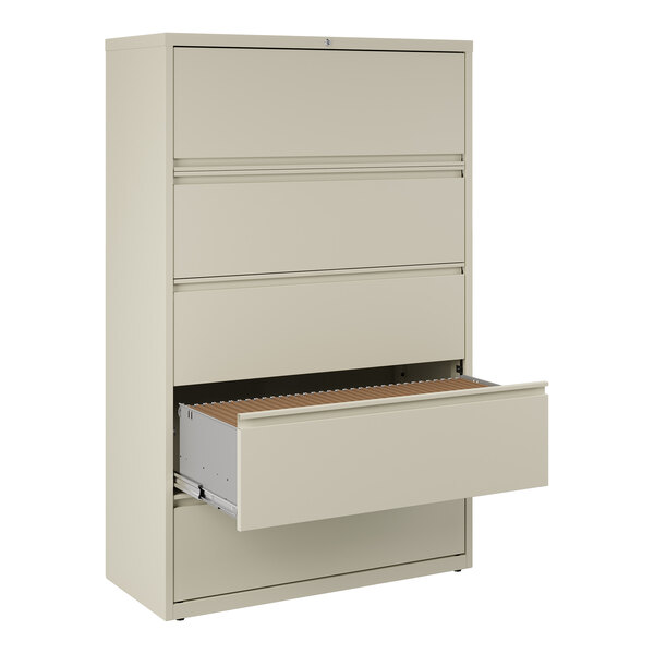 A five-drawer putty-colored lateral file cabinet with one drawer open, designed for binder and file storage.