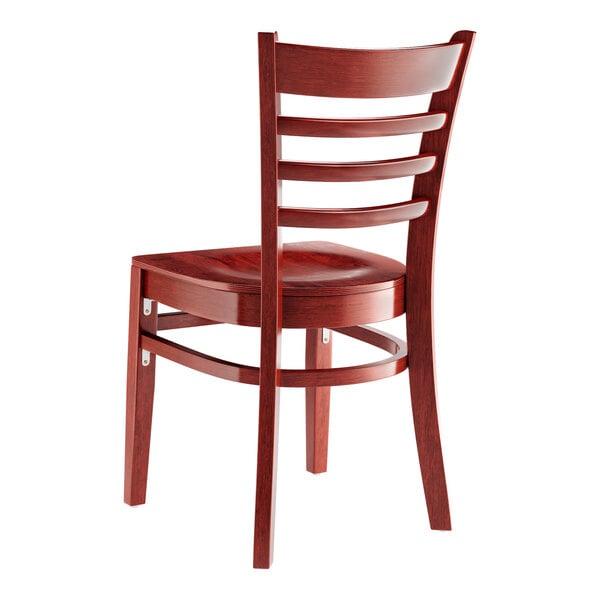 A Lancaster Table & Seating mahogany wood ladder back chair with a mahogany wood seat.