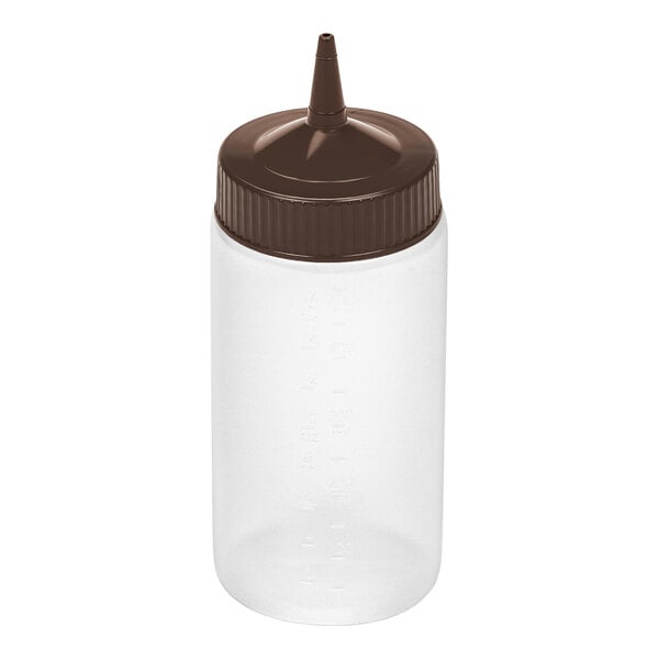 A clear plastic squeeze bottle with a brown, pointed nozzle cap.