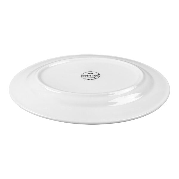 A white oval platter shown upside down with a small logo or label in the center.